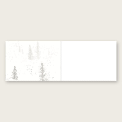 Rolling Hare Christmas, First Edition card by Tim Hupkes, opened: snowy trees on the inside left, blank on the right