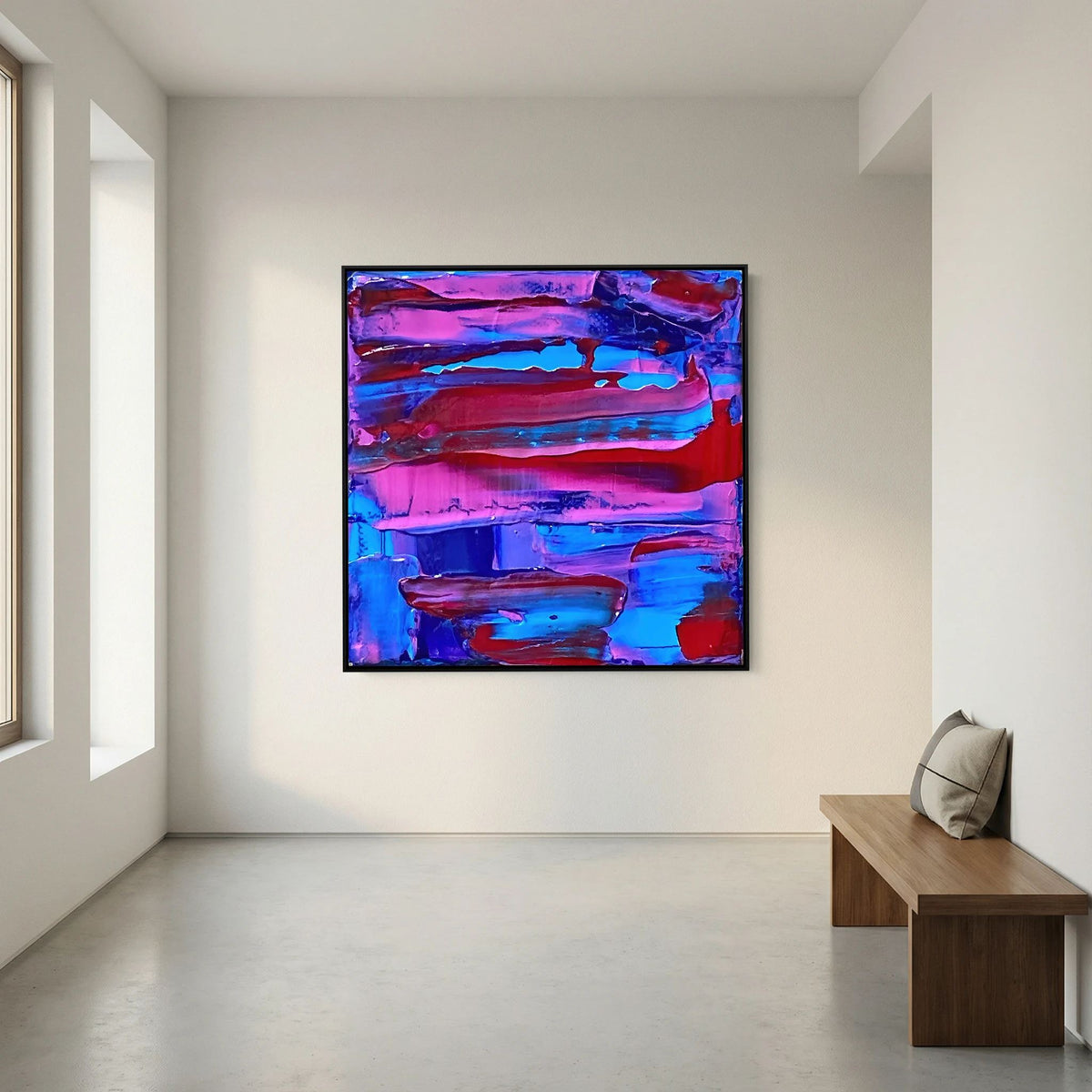 Sunset Overflow van Tim Hupkes in een zwarte lijst aan een witte muur in een minimalistische ruimte met een houten bank en betonvloer