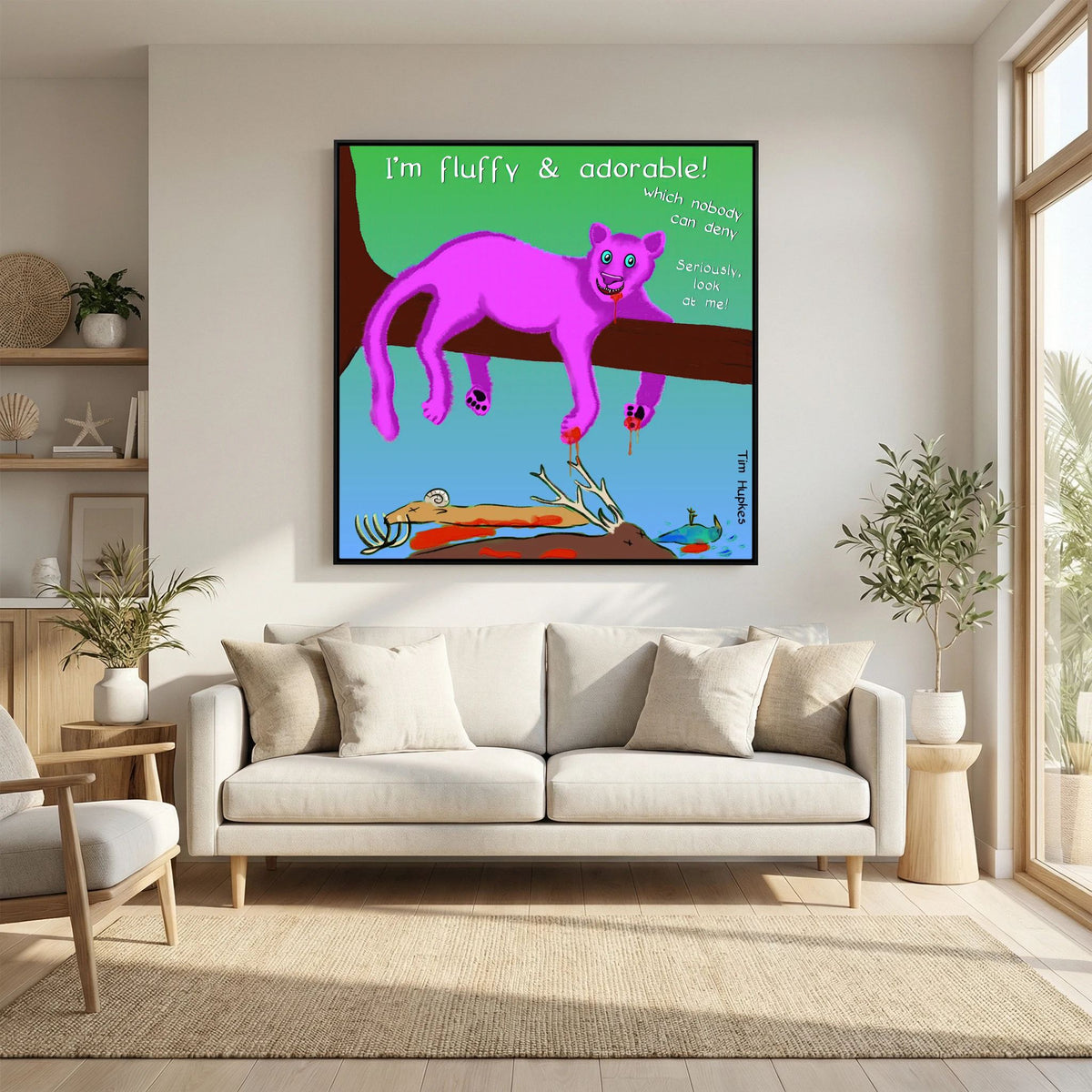 Fluffy Pink Panther by Tim Hupkes in a black frame hanging above a cream sofa in a bright living room with large windows