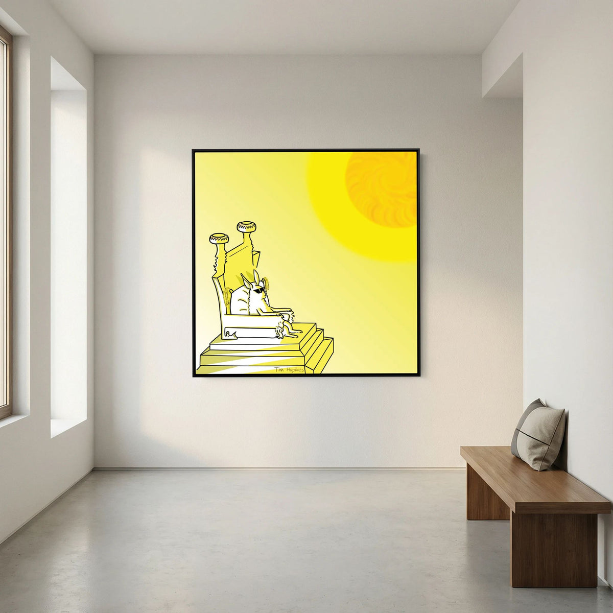 Black-framed Royal by Tim Hupkes canvas hanging in a minimal white room with a concrete floor and a wooden bench