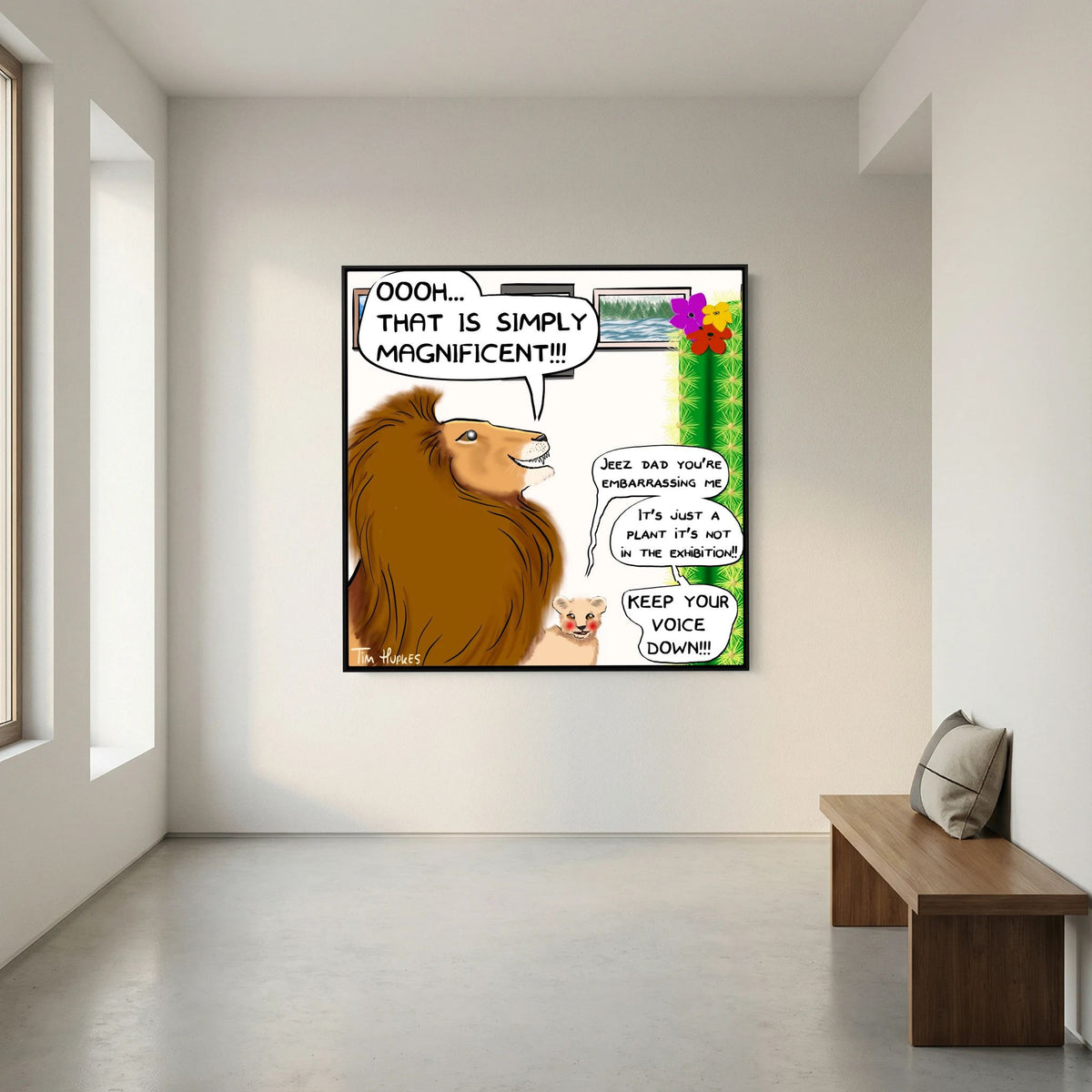 Faux Pas by Tim Hupkes in a black frame on a white wall in a minimal space beside a wooden bench with a cushion
