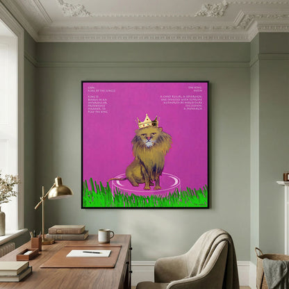 The King canvas print in a black frame above a wooden desk in a study with green walls