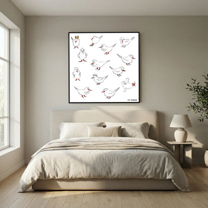 Black-framed Blackburn & Haptoe - everyday heroes by Tim Hupkes above a low double bed with neutral bedding in a quiet bedroom