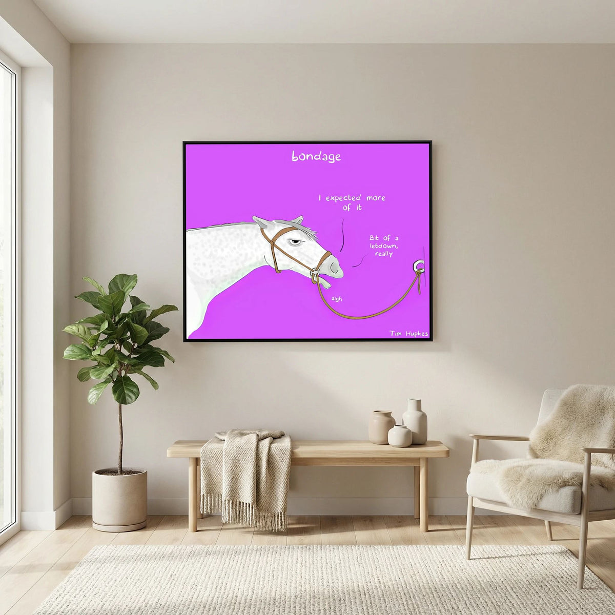 Bondage canvas print in a black frame above a wooden bench in a living room