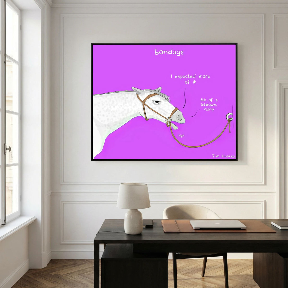 Bondage canvas print in a black frame above a dark wooden desk in a panelled home office