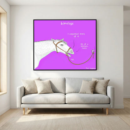 Bondage canvas print in a black frame above a light grey sofa in a living room